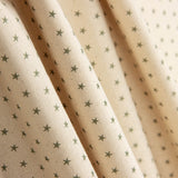 Popelín Estampado Estrellas Verde-Crudo - Ribes y Casals