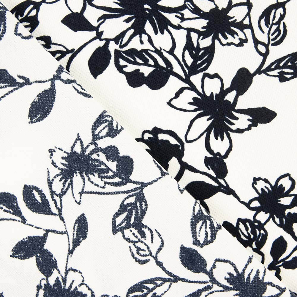 Piqué Poliéster Flores Negro - Ribes y Casals
