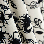 Piqué Poliéster Flores Negro - Ribes y Casals