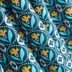 Popelín Medallas Flor Turquesa - Ribes y Casals