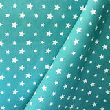 Popelín Algodón Estrellas Fondo Aguamarina - Ribes y Casals