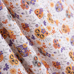 Popelín Algodón Calaveras Naranja - Ribes y Casals