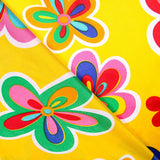 Raso Carnaval Flor Hippie Amarillo - Ribes y Casals