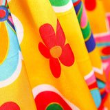 Retal Raso Carnaval Flor Hippie Amarillo 75x140 cm - Ribes y Casals