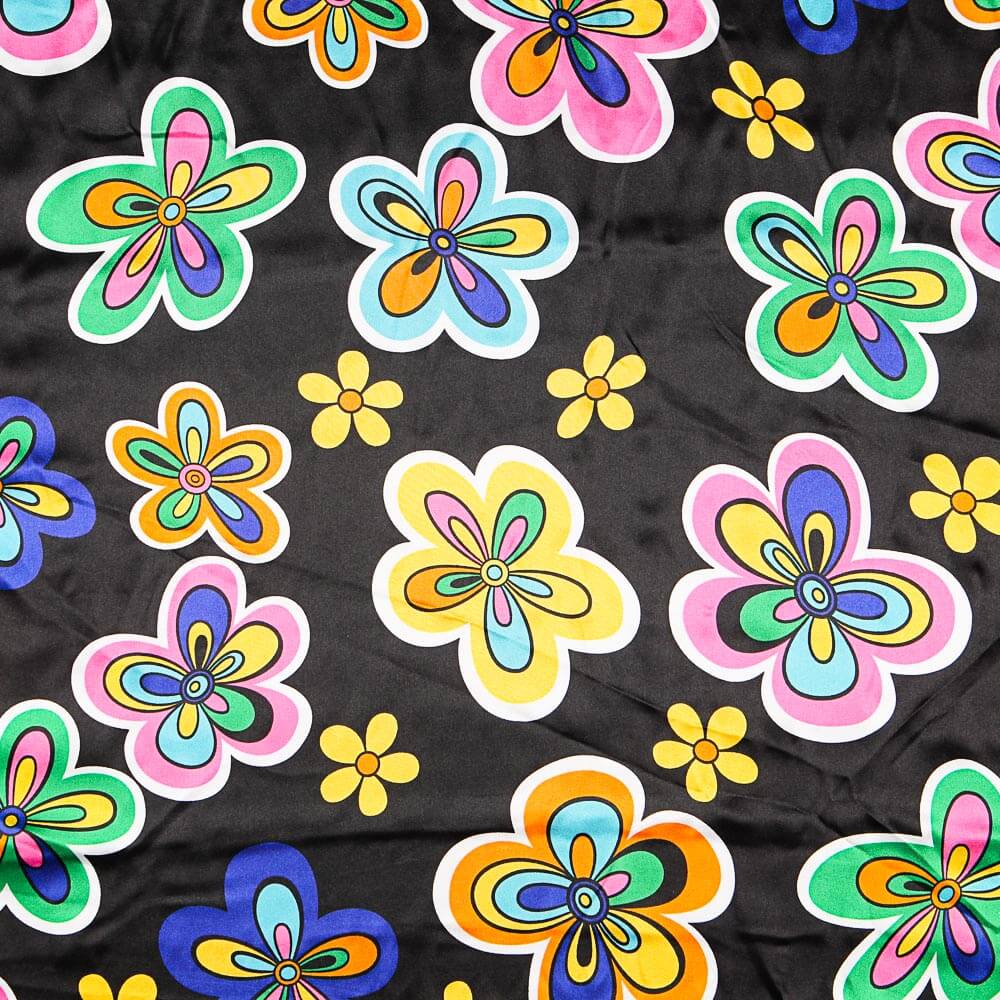 Raso Carnaval Flor Hippie Negro - Ribes y Casals