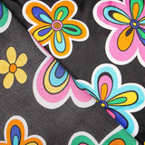 Raso Carnaval Flor Hippie Negro - Ribes y Casals