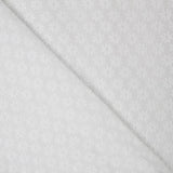 Tela Bordado Suizo Margaritas Blanco Natural - Ribes y Casals