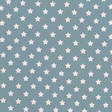 Tela Estrellas Blanca Fondo Turquesa - Ribes y Casals
