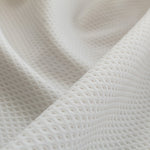 Tela Piqué Ojo Perdiz Beige - Ribes y Casals