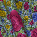 Tela Popelín Flamenca Clavel Fondo Agua - Ribes y Casals